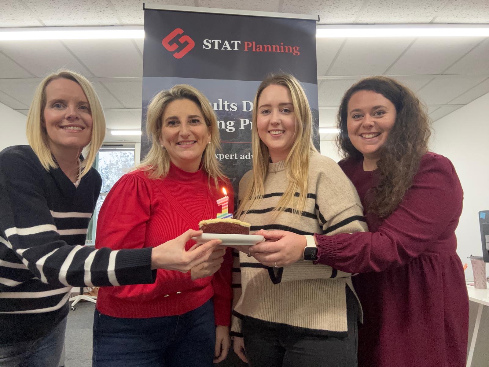 The STAT Planning team celebrating a company milestone in the office, reflecting their collaborative spirit and commitment to UK planning solutions.